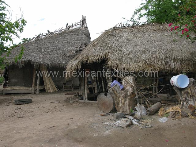 cozomatlan_nahua25.JPG - This is part of the back yard with more traditional structures.